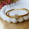 Radiant Halo Gold Bangle